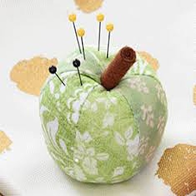 Apple shaped pin cushion