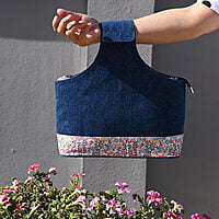 The bloom wrist bag